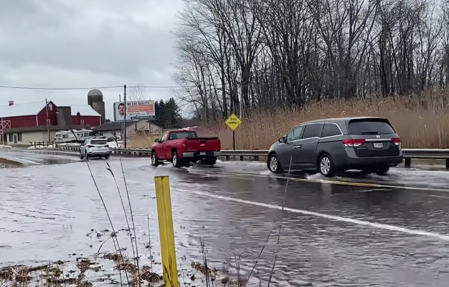 This area of Wales Road (Route 241) north of Strausser Street NW in Jackson Township was an area of high water Thursday afternoon due to rain and snowmelt.