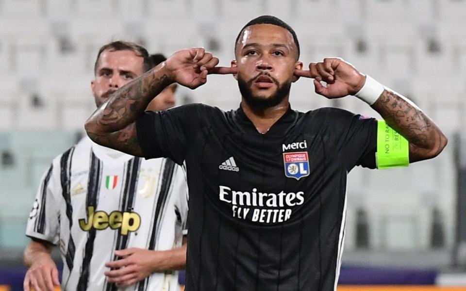 Memphis' trademark celebration after scoring for Lyon at Juventus - AFP