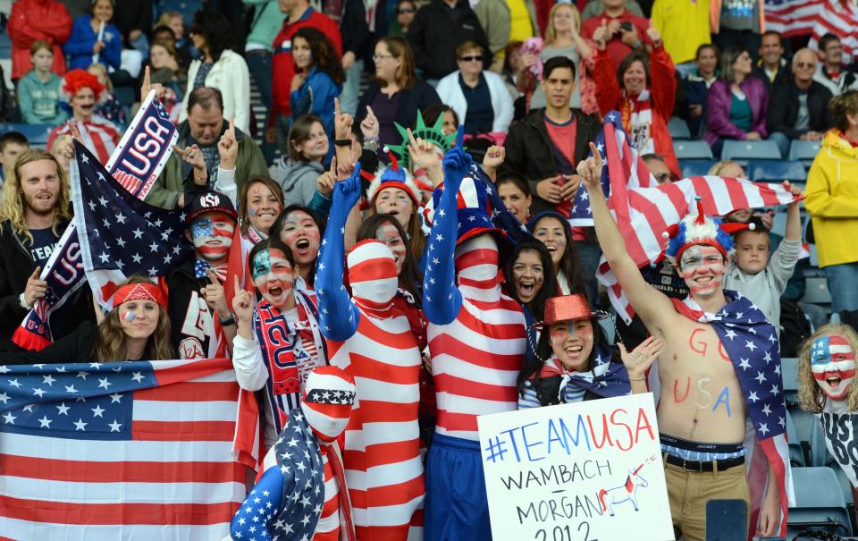 USA fans cheer during the women's soccer preliminary match against Colombia in the 2012 London Olympic Games at Hampden Park. (US Presswire)