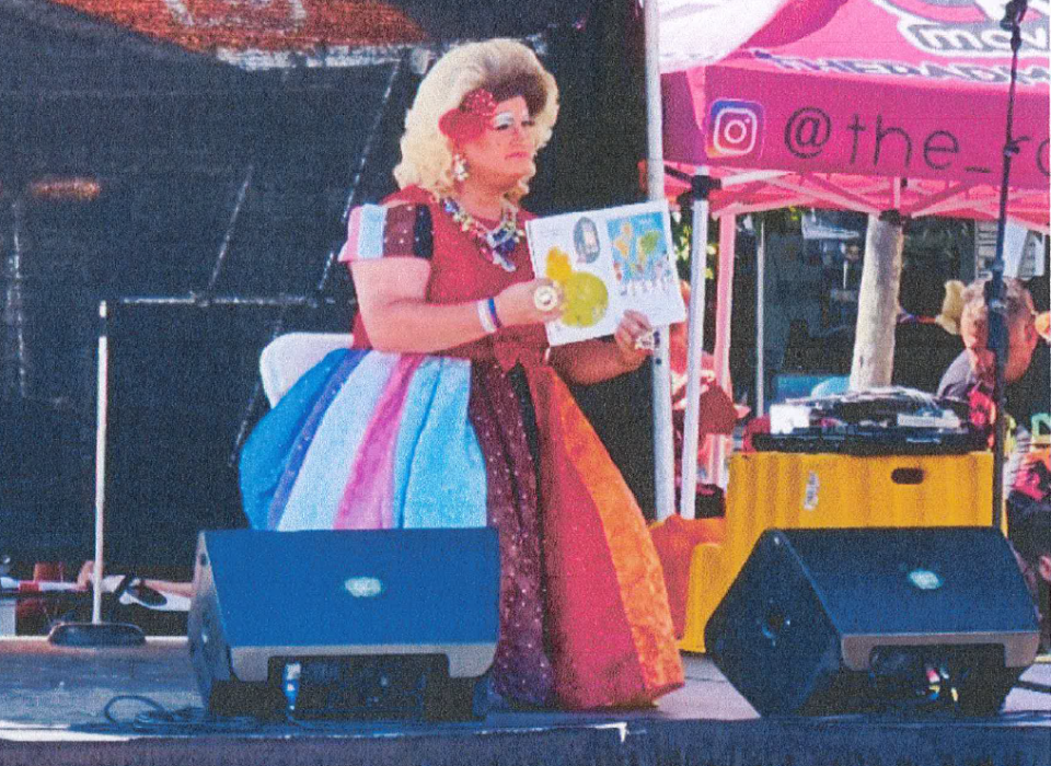 During the Sept. 27 Melbourne City Council meeting, officials discussed this photo of a drag queen reading a book during the Space Coast Pride festival.