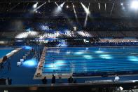<p>The Olympic Pool is seen ahead of the final of the men's 100m butterfly swimming event during the Tokyo 2020 Olympic Games at the Tokyo Aquatics Centre in Tokyo on July 31, 2021. (Photo by Attila KISBENEDEK / AFP)</p> 