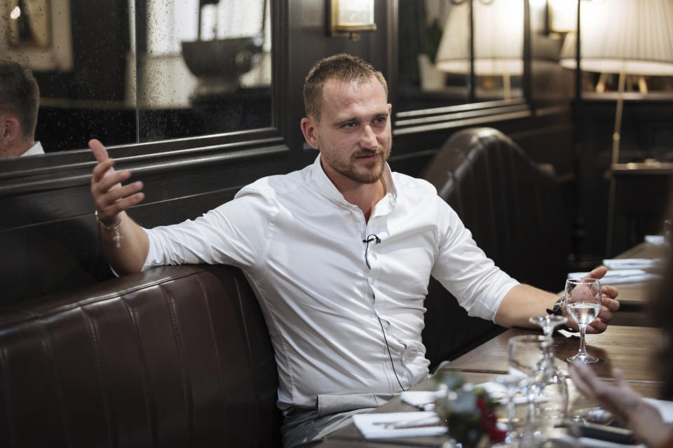 Russian paratrooper Pavel Filatiev speaks during an interview in Paris on Tuesday, Sept. 6, 2022, after publishing a journal about his experience fighting in Ukraine. Pavel Filatiev was part of a Russian unit that seized the Ukrainian port city of Kherson early in the war. (AP Photo/Lewis Joly)