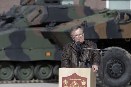 Denmark’s Defence Minister Claus Hjort Frederiksen speaks during the official ceremony welcoming the deployment of a multi-national NATO battalion in Tapa, Estonia, April 20, 2017. REUTERS/Ints Kalnins