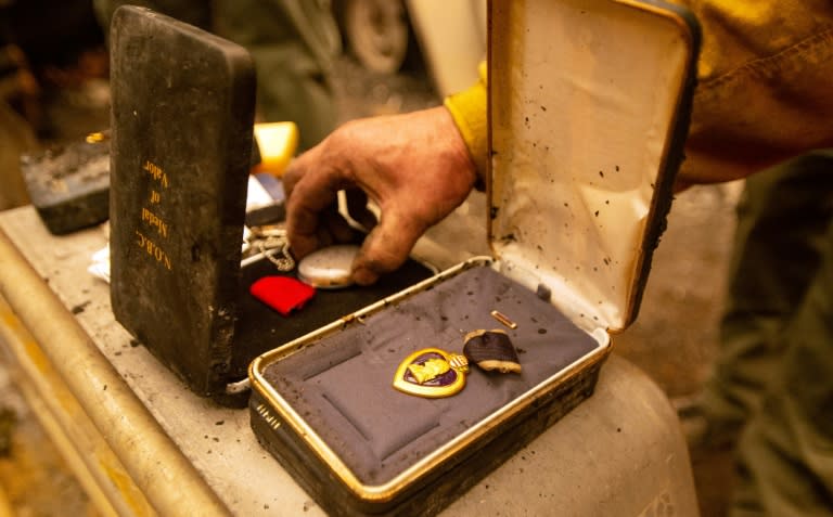 Firefighters discover a Purple Heart and other medals of valor at a burned property in Paradise