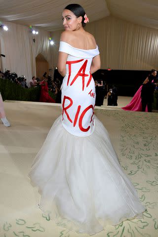 <p>Kevin Mazur/MG21/Getty</p> Alexandria Ocasio-Cortez at the 2021 Met Gala.