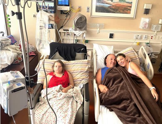 The author and her family wait together while Emily (left), who has Schimke immuno-osseous dysplasia, is in the hospital.