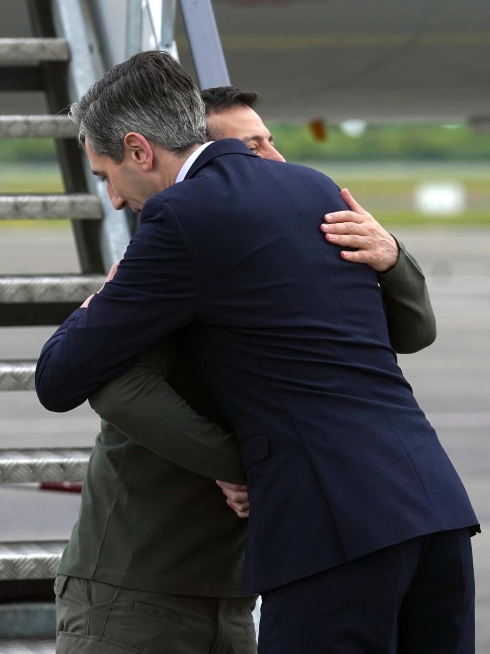 The two leaders embraced on the airport tarmac (Brian Lawless/PA) (PA Wire)