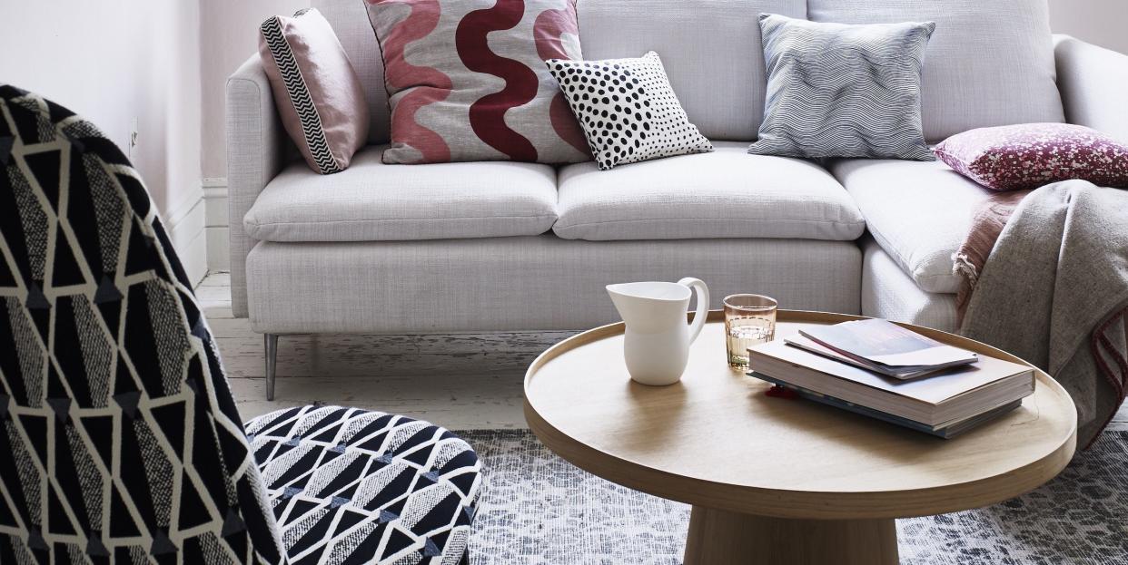 small living room with sofa, armchair and coffee table