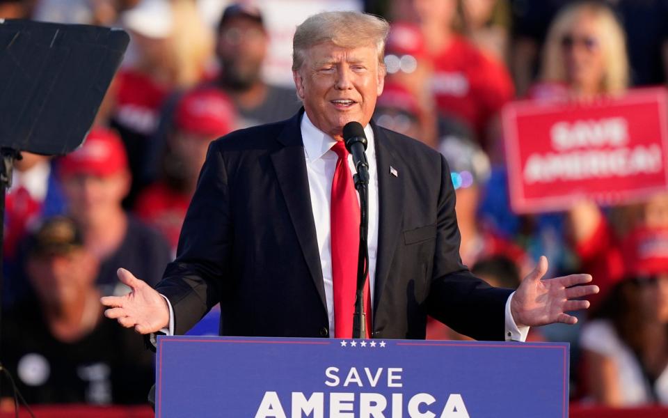  Former President Donald Trump speaks at a rally - AP