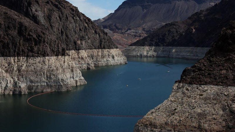 A bleached ‘bathtub ring’ is visible on the banks of Lake Mead near the Hoover Dam on August 19, 2022 in Lake Mead National Recreation Area, Arizona.