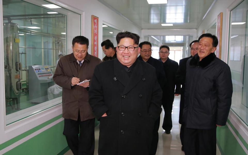 North Korean leader Kim Jong-Un visiting the Pyongyang Pharmaceutical Factory - AFP