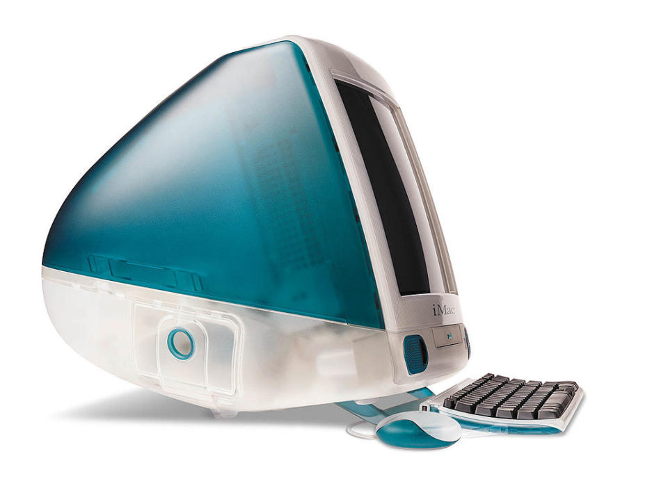 large colorful imac with a keyboard and mouse