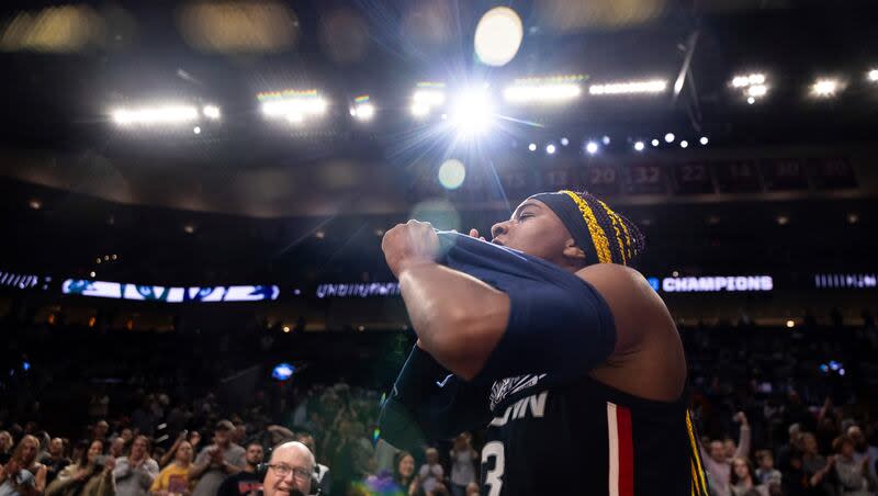 UConn forward Aaliyah Edwards (3) celebrates the win over Southern California in an Elite Eight college basketball game in the women's NCAA Tournament, Monday, April 1, 2024, in Portland, Ore. (AP Photo/Howard Lao)