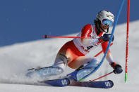 Switzerland's Michelle Gisin speeds down the course during an alpine ski, women's World Cup slalom, in Are, Sweden, Sunday, March 10, 2024. (AP Photo/Alessandro Trovati)