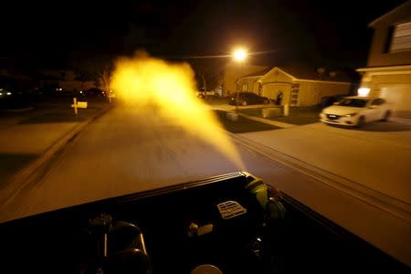 Hillsborough County mosquito control drives through a neighborhood spraying against mosquitos in Hillsborough County, Florida, February 2, 2016. REUTERS/Scott Audette