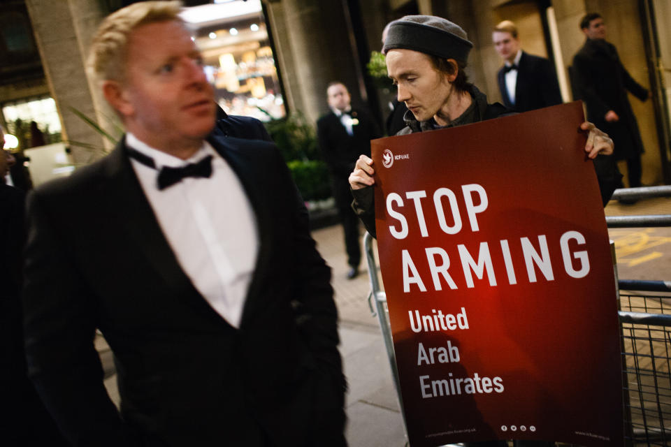  Anti-arms trade activist holds a placard during a protest outside the annual black-tie dinner of the Aerospace, Defence and Security Group at the Grosvenor House Hotel on Park Lane in London. The ADS Group, a London-headquartered non-profit trade organisation, represents and supports more than 1,000 British businesses involved in the aerospace, defence and security and space sectors. The protest was called by the Campaign Against Arms Trade (CAAT) and Stop The Arms Fair pressure groups, citing in particular sales of UK-made weapons and ammunition to Saudi Arabia, which continues to strike Houthi rebels in Yemen in a five-year war that has killed over 100,000 people and left millions more suffering. (Photo by David Cliff / SOPA Images/Sipa USA) 