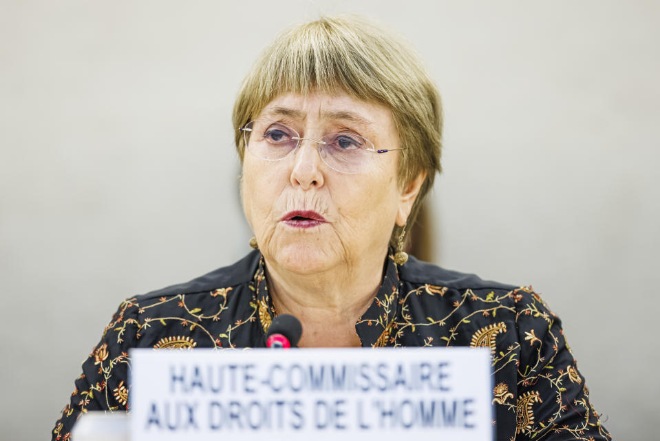 Michelle Bachelet, High Commissioner for Human Rights, delivers her statement during the opening day of the 50th session of the Human Rights Council, at the European headquarters of the United Nations in Geneva, Switzerland, Monday, June 13, 2022. (Valentin Flauraud/Keystone via AP)