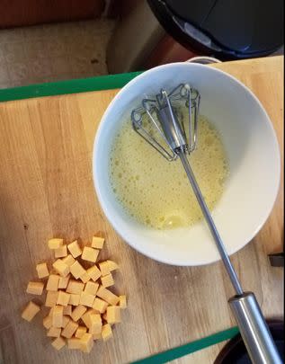 A rotating whisk blender to make beating eggs, mixing batter, and frothing milk so easy