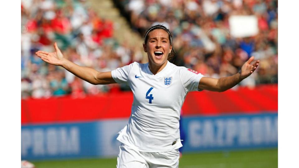 Fara Williams running in england kit