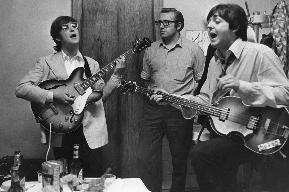 <p>Robert Whitaker</p> John Lennon, Mal Evans and Paul McCartney backstage at Munich