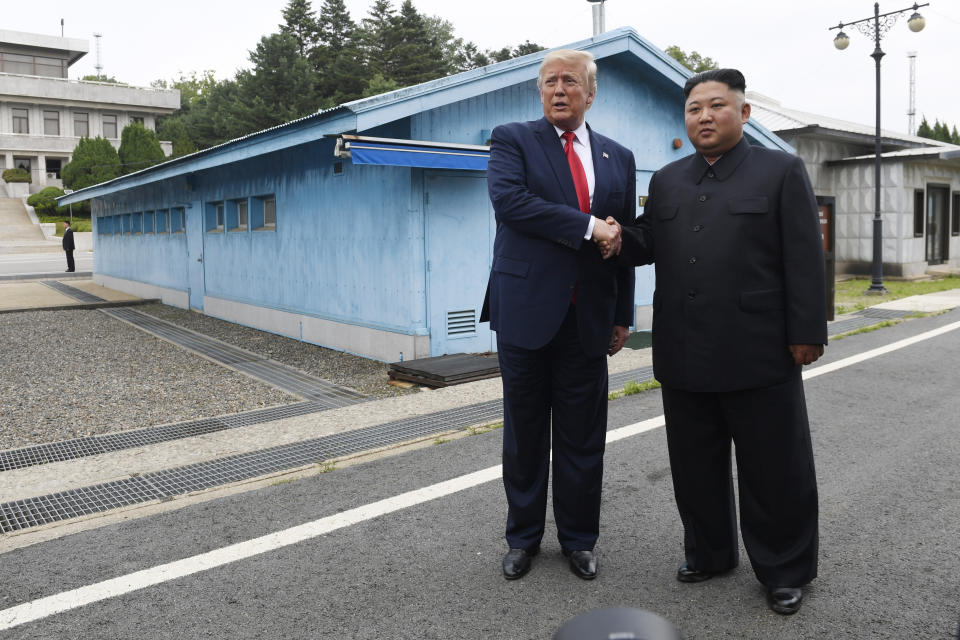 FILE - In this June 30, 2019, file photo, U.S. President Donald Trump, left, meets with North Korean leader Kim Jong Un at the border village of Panmunjom in the Demilitarized Zone, South Korea. North Korea on Tuesday, July 16, 2019, says it is rethinking whether to abide by its moratorium on nuclear and missile tests and other steps aimed at improving ties with the U.S. (AP Photo/Susan Walsh, File)