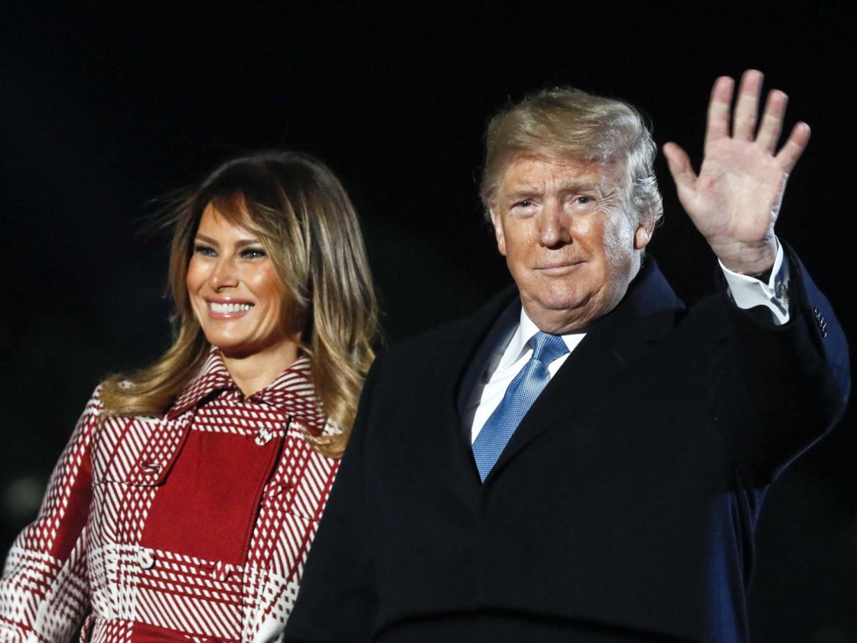 First lady Melania Trump and president Donald Trump attend the 97th Annual National Christmas Tree Lighting Ceremony in President's Park in Washington, DC, on 5 December 2019: Paul Morigi/Getty