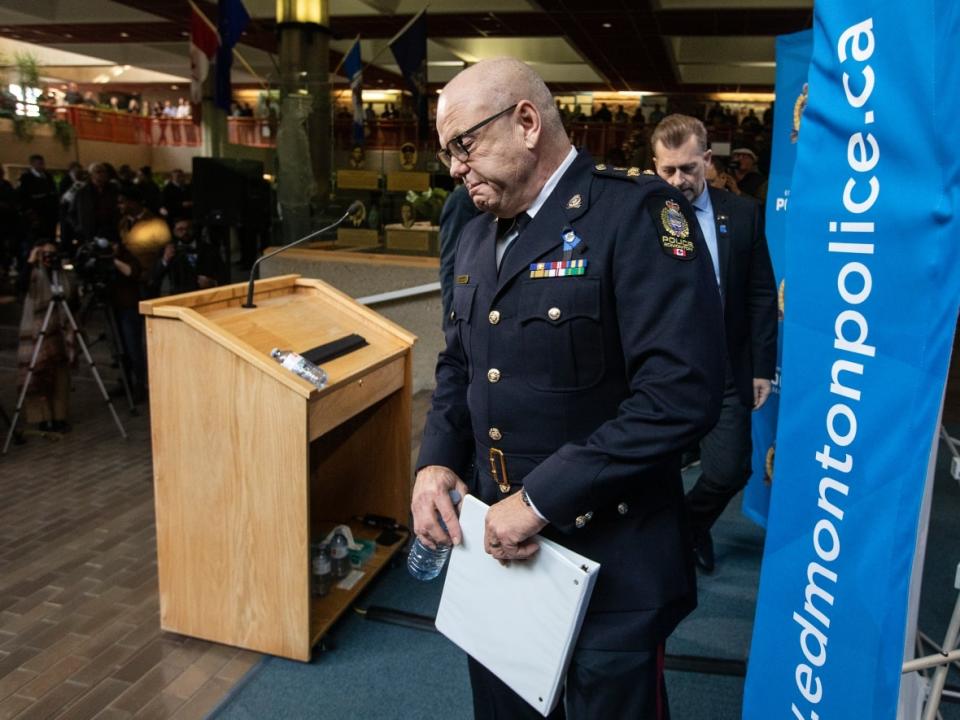 Edmonton Police Chief Dale McFee leaves to speak with the media about two police officers who were shot dead on duty in Edmonton on Thursday, March 16, 2023.  (Jason Franson/The Canadian Press - photo credit)
