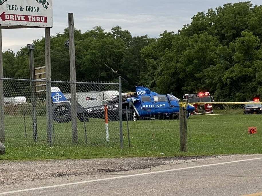A preliminary investigation of the helicopter crash found the helicopter contacted power lines, sending the helicopter to the ground in the “hard landing.”