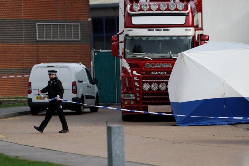 The scene where bodies were discovered in a lorry container, in Grays, Essex