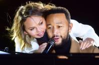 <p>Chrissy Teigen and John Legend cuddle up while making an appearance in support of the Biden/Harris campaign in Philadelphia.</p>