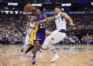 Jan 22, 2017; Dallas, TX, USA; Dallas Mavericks guard Justin Anderson (1) fouls Los Angeles Lakers guard Louis Williams (23) during the second half at the American Airlines Center. The Mavericks defeat the Lakers 122-73. Mandatory Credit: Jerome Miron-USA TODAY Sports