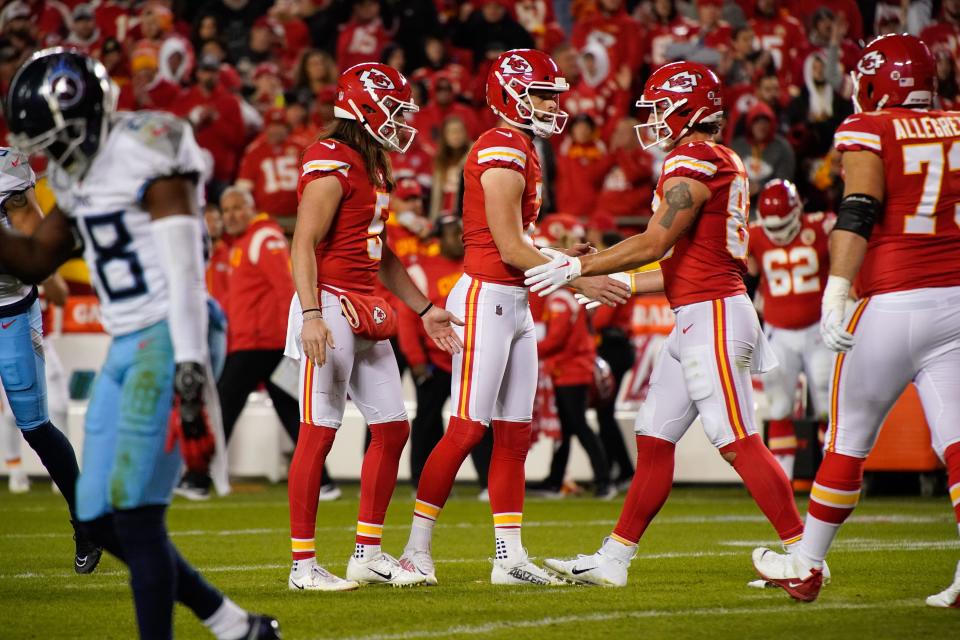 Kansas City Chiefs place kicker Harrison Butker (7) is congratulated after kicking the game winning field goal against the Tennessee Titans in over time at GEHA Field at Arrowhead Stadium Sunday, Nov. 6, 2022, in Kansas City, Mo. 