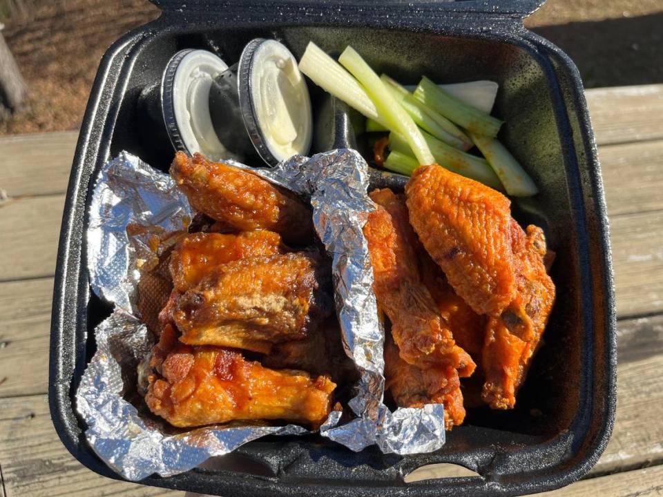 The 10-piece wing special at Catch 21 includes a choice of two flavors, celery sticks and your choice of ranch or blue cheese dip.