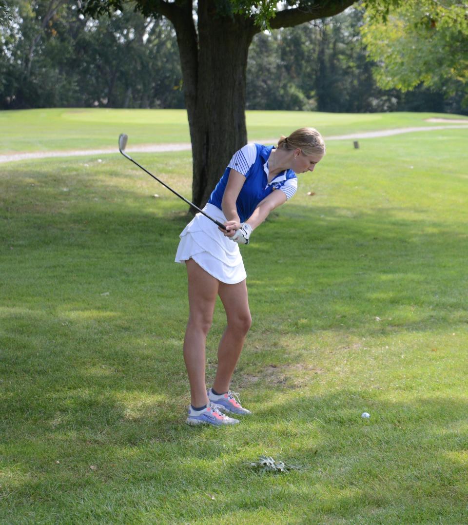 Gibraltar Carlson's Anika Irwin hits during the Monroe County Girls Gol Championships Thursday.