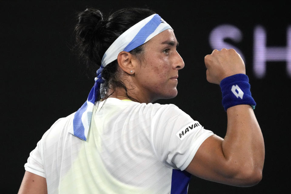 Ons Jabeur of Tunisia reacts after winning a point against Tamara Zidansek of Slovenia during their first round match at the Australian Open tennis championship in Melbourne, Australia, Tuesday, Jan. 17, 2023. (AP Photo/Aaron Favila)