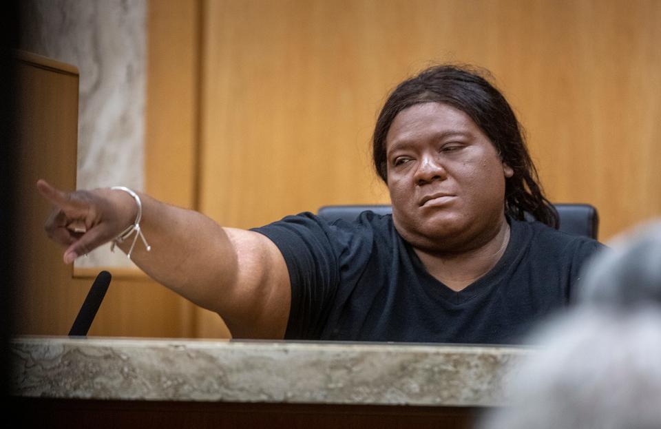 Roderick Burgess identifies the defendant Marcelle Waldon during testimony in Waldon's trial Thursday. Burgess said he drove Waldon and Jarvis Collins around after the killings, pawning jewelry in Lakeland and Plant City.