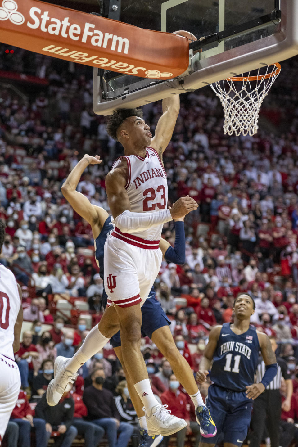 Indiana forward Trayce Jackson-Davis (23) scores with a dunk during the second half of an NCAA college basketball game against Penn State, Wednesday, Jan. 26, 2022, in Bloomington, Ind. (AP Photo/Doug McSchooler)