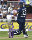 England's Craig Overton plays a shot during the third one day international cricket match between England and India at Emirates Old Trafford cricket ground in Manchester, England, Sunday, July 17, 2022. (AP Photo/Rui Vieira)