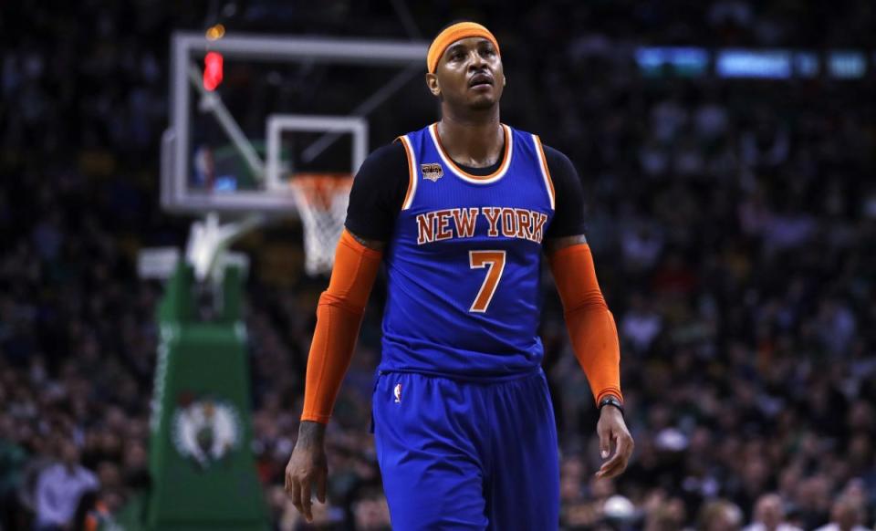 Carmelo Anthony has $54 million remaining over the next two years of his contract. (AP)