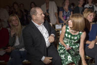 Harvey Weinstien, left, and Anna Wintour attend the FIJI Water-sponsored Marchesa Spring 2013 Fashion Show at Vanderbilt Hall on Wednesday Sept. 12, 2012, in New York. (Photo by Victoria Will/Invision for FIJI Water /AP Images)