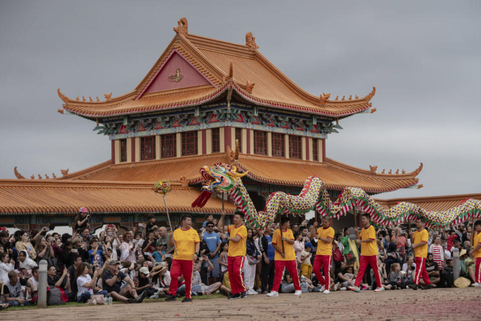 Performers embraced the Year of the Dragon with a showcase at the Nan Hua Buddhist Temple in Bronkhorstspruit, South Africa, on Feb. 11, 2024. <span class="copyright">Ihsaan Haffejee—Getty Images</span>