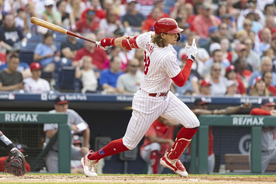 Philadelphia Phillies' Alec Bohm follows through on an RBI single against the Washington Nationals during the second inning of a baseball game Friday, June 30, 2023, in Philadelphia. (AP Photo/Laurence Kesterson)