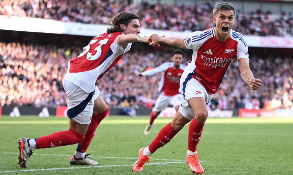 <span>Leandro Trossard shows his delight after Arsenal’s third goal against Leicester</span><span>Photograph: Daniel Hambury/EPA</span>