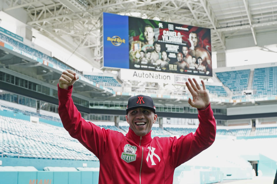 Boxer Avni Yildirim gestures during a media availability at Hard Rock Stadium, Monday, Feb. 22, 2021, in Miami Gardens, Fla. Yildirim will challenge Saul "Canelo" Alvarez for the super middleweight title on Saturday. (AP Photo/Marta Lavandier)