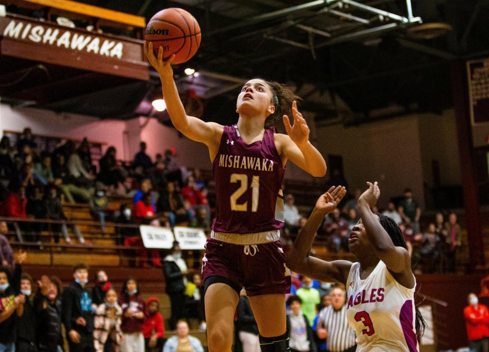 Mishawaka's Kasha Davidovic (21) drives to the basket during the Mishawaka vs. Adams girls sectional basketball game Tuesday, Feb. 1, 2022 at Mishawaka High School. 