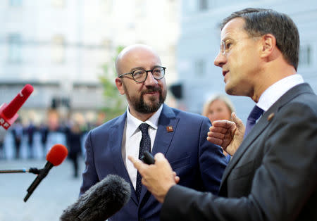 Netherlands' Prime Minister Mark Rutte and Belgium's Prime Minister Charles Michel speak to the media as they arrive for the informal meeting of European Union leaders in Salzburg, Austria, September 20, 2018. REUTERS/Lisi Niesner