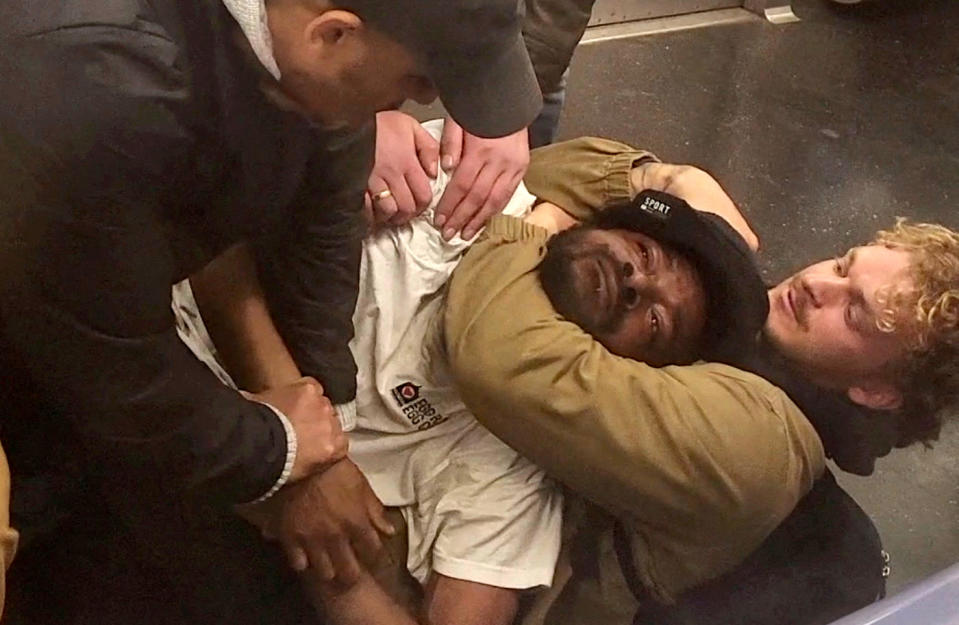 A man identified as 30-year-old Jordan Neely, is placed in a choke hold by a fellow passenger on a subway