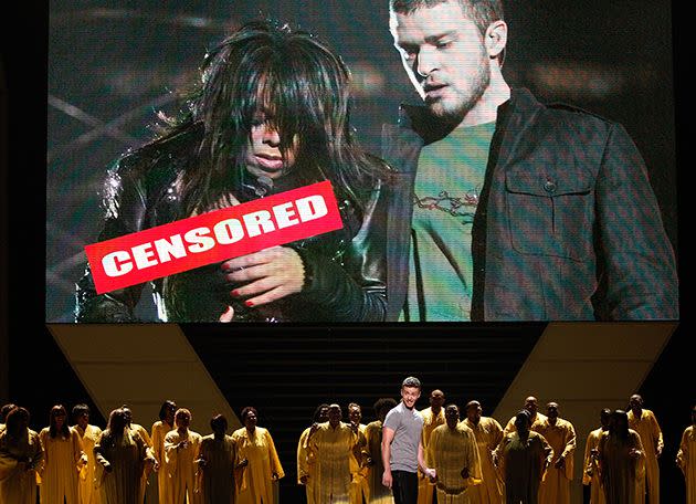 Host Justin Timberlake stands onstage in front of a video of himself and Janet Jackson from Super Bowl XXXVIII onstage at the 2008 ESPY Awards. Photo: Getty