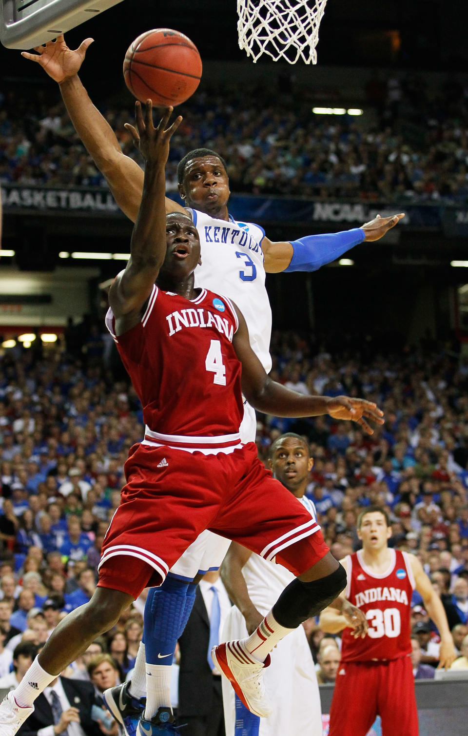ATLANTA, GA - MARCH 23: Victor Oladipo #4 of the Indiana Hoosiers shoots against the defense of Terrence Jones #3 of the Kentucky Wildcats in the first half during the 2012 NCAA Men's Basketball South Regional Semifinal game at the Georgia Dome on March 23, 2012 in Atlanta, Georgia. (Photo by Kevin C. Cox/Getty Images)