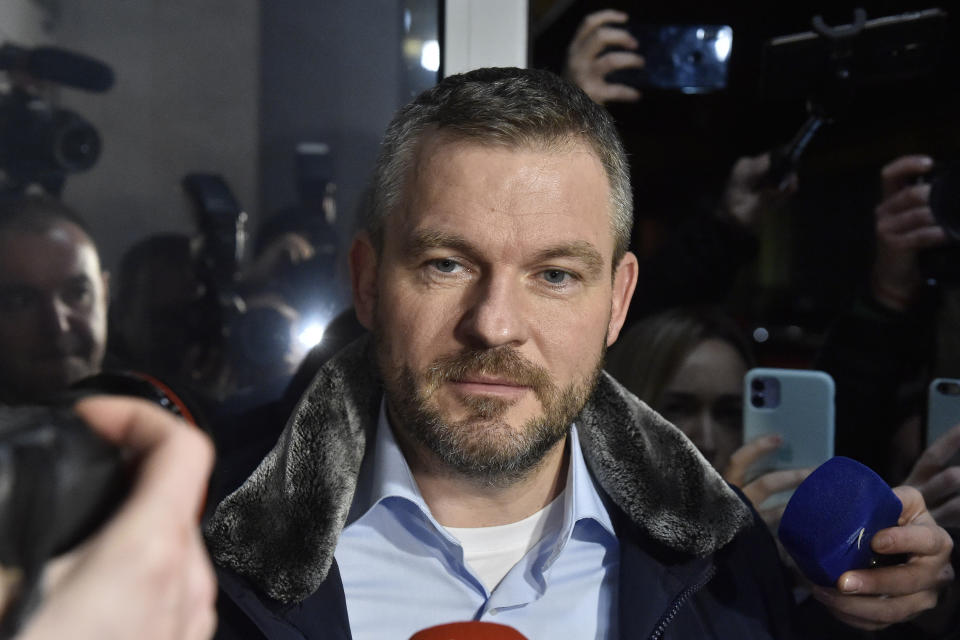 Slovak Deputy Prime Minister Peter Pellegrini talks to journalists as he arrives at the Smer-SD party headquarters after the general elections in Bratislava, Slovakia, Saturday, Feb. 29, 2020. Two exit polls showed late Saturday that Slovakia's opposition appears to be winning parliamentary elections widely expected to unseat the long-dominant but scandal-tainted leftist party that governed on an anti-immigration platform. (Vaclav Salek/CTK via AP)